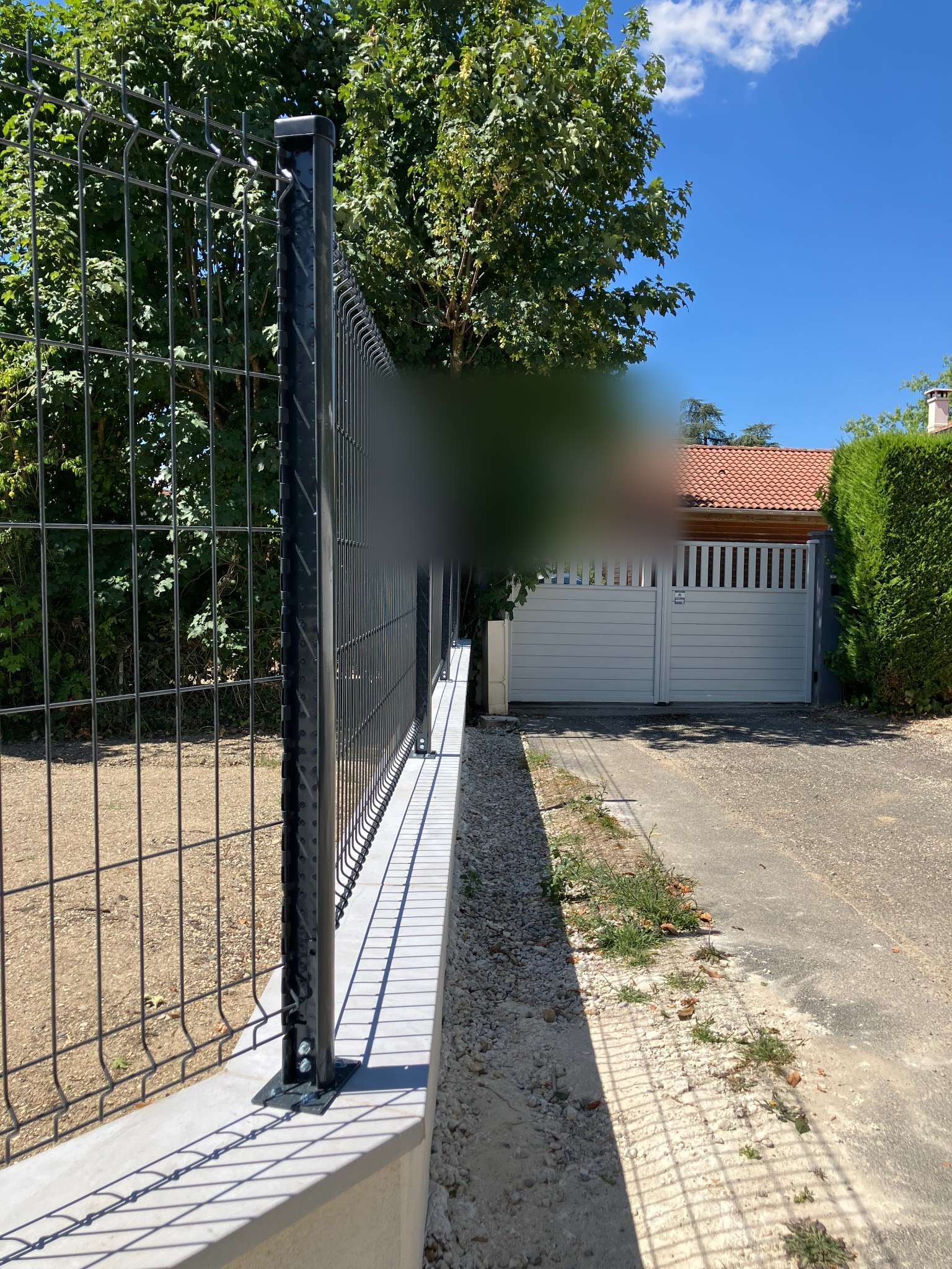 Muret et clôture terminés